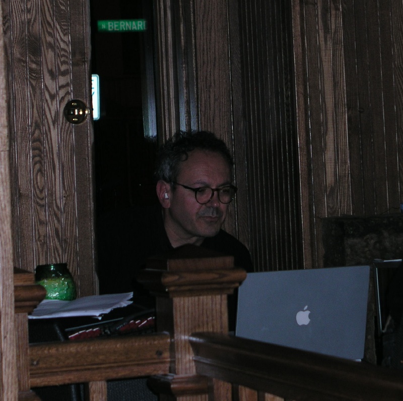 Hector Zazou off in a corner, playing the Mac