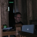 Hector Zazou off in a corner, playing the Mac